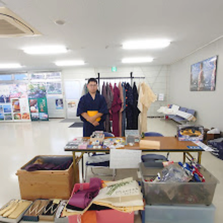 Kimono and textile items displayed at an indoor sales area in Japan